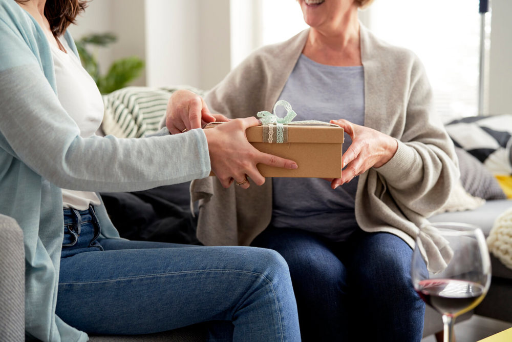 Close up of gift for senior woman stock photo